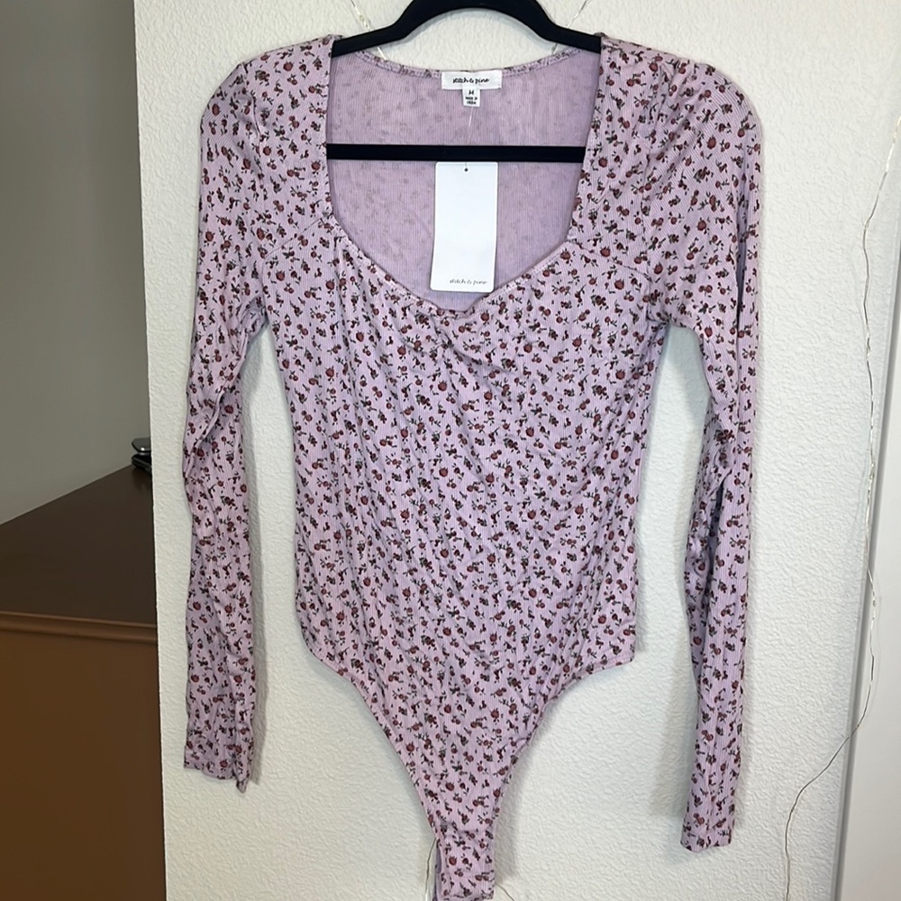 Free Gift W Purchase* NWT Lavender floral long sleeve body suit. Size medium.